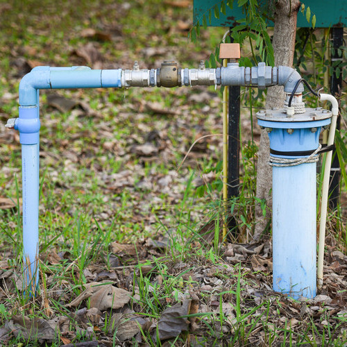 Groundwater well pump with pvc pipe and system